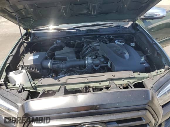 2022 Toyota Tacoma Limited with VIN 3TMGZ5AN6NM494218, listed as a Copart auction lot 64678695 with 51,659 mi miles and Salvage title. Bid and sale history available at DreamBid. Image 11.