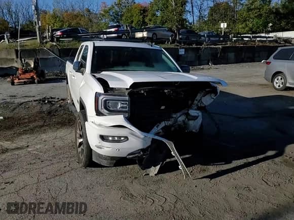 2018 GMC Sierra 1500 SLT с VIN 1GTV2NEC4JZ322721, выставлен на аукционе Copart как лот 86707515 с пробегом 83 496 миль миль и Списание • Salvage title. История ставок и продаж доступна на DreamBid. Изображение 13.