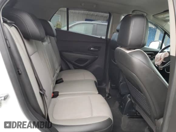 2016 Chevrolet Trax LT z VIN KL7CJPSBXGB762698, wystawiony jako Copart lot #87237255 z przebiegiem 92 520 mil mil oraz Szkoda całkowita • Salvage title. Historia ofert i sprzedaży dostępna na DreamBid. Obrazek 11.