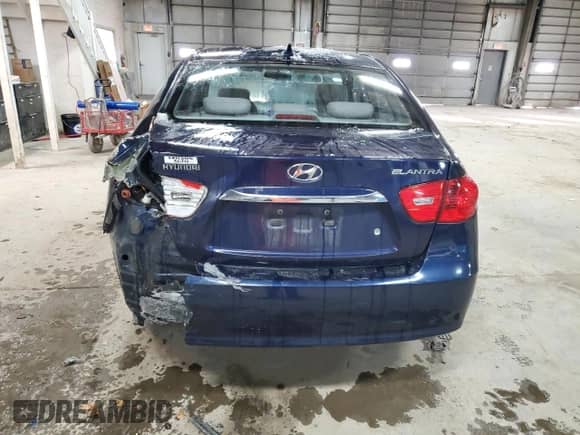 2010 Hyundai Elantra Blue с VIN KMHDU4AD2AU901973, выставлен на аукционе Copart как лот 87307304 с пробегом 141 524 миль миль и Списание • Salvage title. История ставок и продаж доступна на DreamBid. Изображение 6.