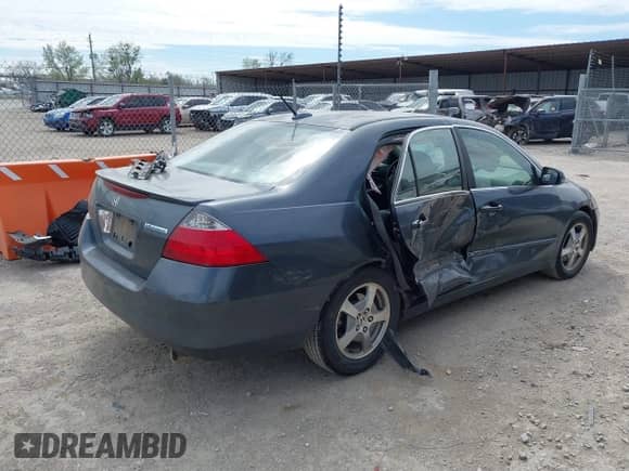 2006 Honda Accord with NAVI z VIN JHMCN36516C003434, wystawiony jako IAAI lot #41850808 z przebiegiem 176 288 mil mil oraz . Historia ofert i sprzedaży dostępna na DreamBid. Obrazek 4.