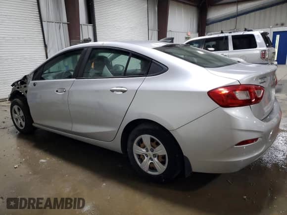 2017 Chevrolet Cruze LS с VIN 3G1BC5SM5HS566164, выставлен на аукционе Copart как лот 86081135 с пробегом 96 701 миль миль и Списание • Salvage title. История ставок и продаж доступна на DreamBid. Изображение 2.