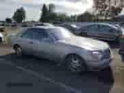 1993 Mercedes-Benz 500 с VIN WDBGA70E2PA135256, выставлен на аукционе Copart как лот 85974174 с пробегом 66 101 миль миль и Списание • Salvage title. История ставок и продаж доступна на DreamBid. Изображение 4.