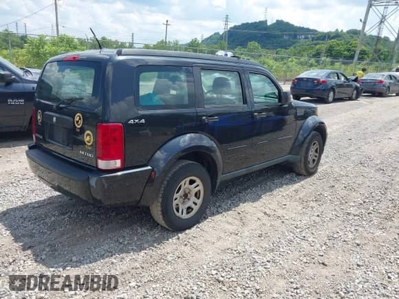 2011 Dodge Nitro SE with VIN 1D4PU2GK8BW599285, listed as a IAAI auction lot 42601484 with 192,579 mi miles and . Bid and sale history available at DreamBid. Image 4.