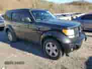 2011 Dodge Nitro SXT z VIN 1D4PU5GK5BW575754, wystawiony jako Copart lot #79841234 z przebiegiem 246 589 mil mil oraz Szkoda całkowita • Salvage title. Historia ofert i sprzedaży dostępna na DreamBid. Obrazek 4.