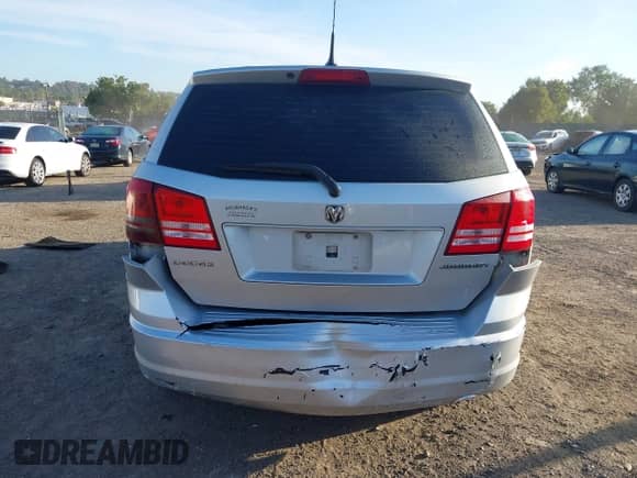 2010 Dodge Journey SE z VIN 3D4PG4FB3AT257705, wystawiony jako IAAI lot #43370601 z przebiegiem 245 457 mil mil oraz . Historia ofert i sprzedaży dostępna na DreamBid. Obrazek 16.