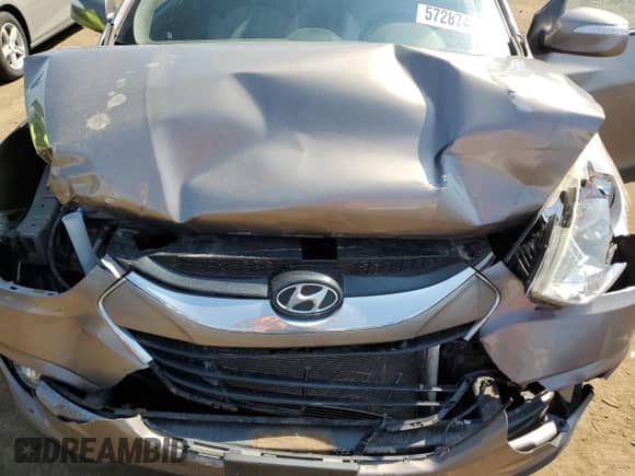 2011 Hyundai Tucson Limited z VIN KM8JU3ACXBU191663, wystawiony jako Copart lot #57287455 z przebiegiem 114 021 mil mil oraz Czysty tytuł • Clean title. Historia ofert i sprzedaży dostępna na DreamBid. Obrazek 11.