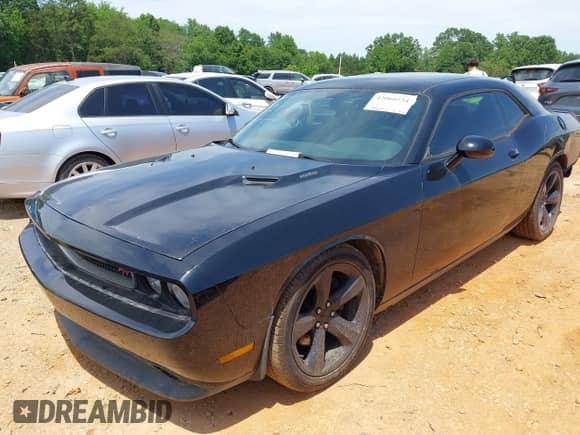 2014 Dodge Challenger R/T с VIN 2C3CDYBT0EH115289, выставлен на аукционе IAAI как лот 42060234 с пробегом 103 309 миль миль и . История ставок и продаж доступна на DreamBid. Изображение 2.