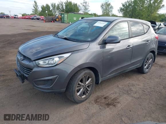 2014 Hyundai Tucson GLS with VIN KM8JTCAFXEU950569, listed as a IAAI auction lot 43243357 with 146,413 mi miles and . Bid and sale history available at DreamBid. Image 2.