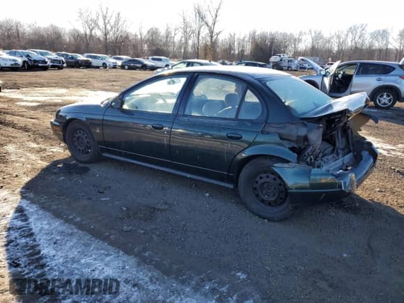 1996 Saturn SL with VIN 1G8ZK5279TZ274736, listed as a Copart auction lot 42434145 with 93,315 mi miles and Salvage title. Bid and sale history available at DreamBid. Image 2.