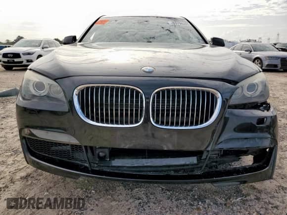 2011 BMW 7 Series 750Li z VIN WBAKB8C5XBCY64741, wystawiony jako Copart lot #63798285 z przebiegiem 100 850 mil mil oraz Szkoda całkowita • Salvage title. Historia ofert i sprzedaży dostępna na DreamBid. Obrazek 5.