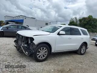 2015 Dodge Durango SXT with VIN 1C4RDHAG1FC244429, listed as a Copart auction lot 68557175 with 102,623 mi miles and Salvage title. Bid and sale history available at DreamBid. Image 1.