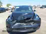 2023 Tesla Model Y Long Range z VIN 7SAYGDEE0PA201841, wystawiony jako IAAI lot #43158634 z przebiegiem 10 356 mil mil oraz . Historia ofert i sprzedaży dostępna na DreamBid. Obrazek 12.