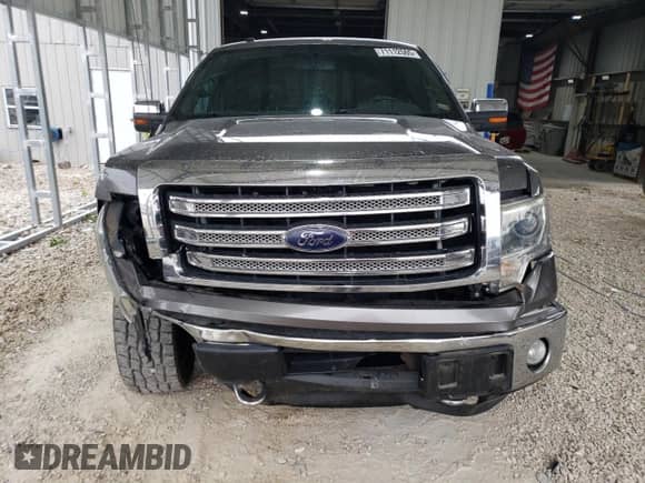 2013 Ford F-150 Lariat with VIN 1FTFW1ET2DFC87796, listed as a Copart auction lot 71112565 with 207,394 mi miles and Salvage title. Bid and sale history available at DreamBid. Image 5.