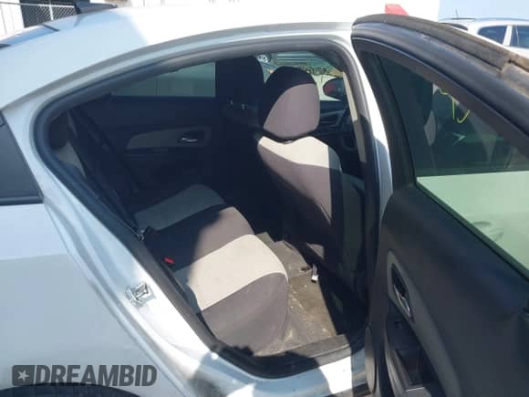 2014 Chevrolet Cruze LS z VIN 1G1PA5SH3E7147223, wystawiony jako IAAI lot #43079180 z przebiegiem 194 625 mil mil oraz . Historia ofert i sprzedaży dostępna na DreamBid. Obrazek 8.