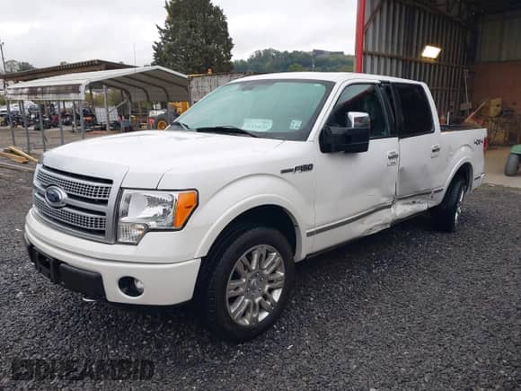 2011 Ford F-150 Lariat z VIN 1FTFW1E66BFA55791, wystawiony jako IAAI lot #43334676 z przebiegiem 110 809 mil mil oraz . Historia ofert i sprzedaży dostępna na DreamBid. Obrazek 2.