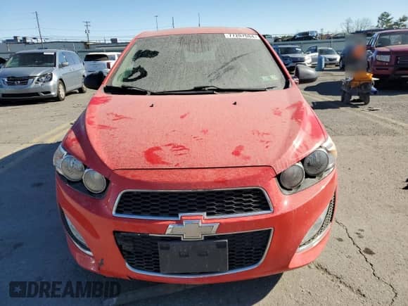 2014 Chevrolet Sonic RS with VIN 1G1JG6SB0E4133237, listed as a Copart auction lot 77207084 with 108,950 mi miles and Salvage title. Bid and sale history available at DreamBid. Image 5.