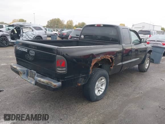 2001 Dodge Dakota Sport z VIN 1B7GG22N81S212519, wystawiony jako IAAI lot #43557080 z przebiegiem 150 028 mil mil oraz . Historia ofert i sprzedaży dostępna na DreamBid. Obrazek 4.