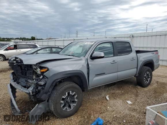2021 Toyota Tacoma SR with VIN 3TMCZ5AN5MM418762, listed as a Copart auction lot 66169995 with 73,465 mi miles and Salvage title. Bid and sale history available at DreamBid. Image 1.