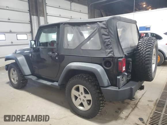 2012 Jeep Wrangler Sport z VIN 1C4AJWAG4CL108575, wystawiony jako Copart lot #83809455 z przebiegiem 180 514 mil mil oraz Szkoda całkowita • Salvage title. Historia ofert i sprzedaży dostępna na DreamBid. Obrazek 2.