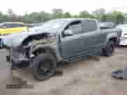 2020 Chevrolet Colorado 4WD LT with VIN 1GCGTCEN7L1235246, listed as a IAAI auction lot 42600889 with 57,012 mi miles and . Bid and sale history available at DreamBid. Image 2.