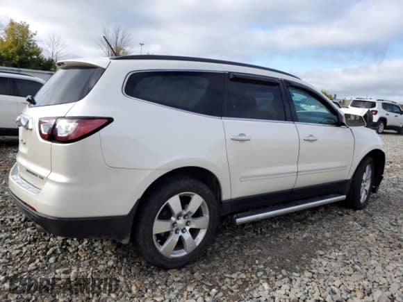2014 Chevrolet Traverse LTZ z VIN 1GNKVJKD9EJ273673, wystawiony jako Copart lot #82049405 z przebiegiem 88 870 mil mil oraz Nie do naprawy • Non repairable. Historia ofert i sprzedaży dostępna na DreamBid. Obrazek 3.