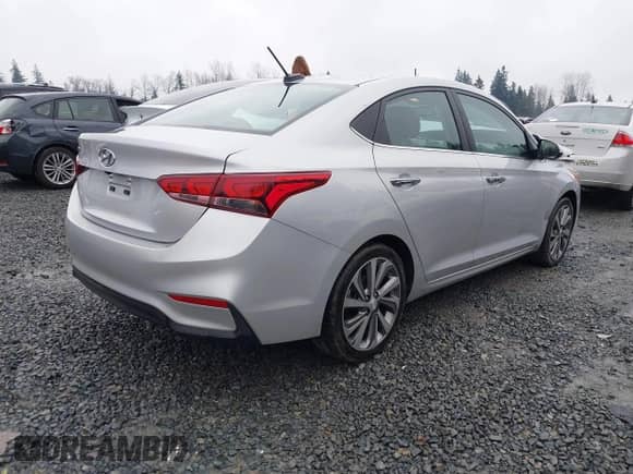 2021 Hyundai Accent Limited z VIN 3KPC34A6XME132842, wystawiony jako IAAI lot #41268124 z przebiegiem 52 698 mil mil oraz . Historia ofert i sprzedaży dostępna na DreamBid. Obrazek 4.