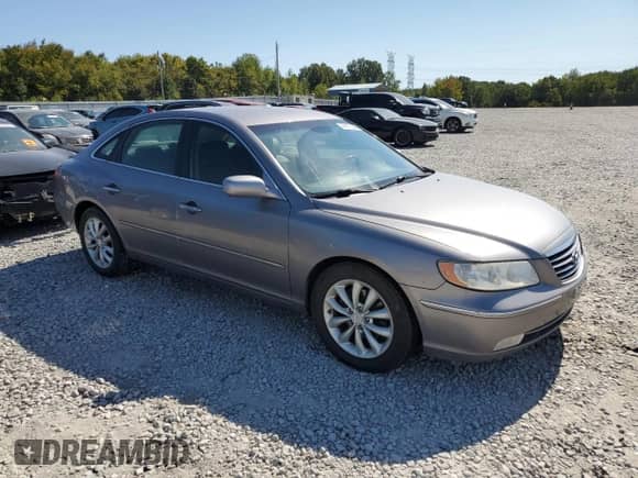 2007 Hyundai Azera SE с VIN KMHFC46F37A233990, выставлен на аукционе Copart как лот 74978354 с пробегом 158 902 миль миль и Списание • Salvage title. История ставок и продаж доступна на DreamBid. Изображение 4.