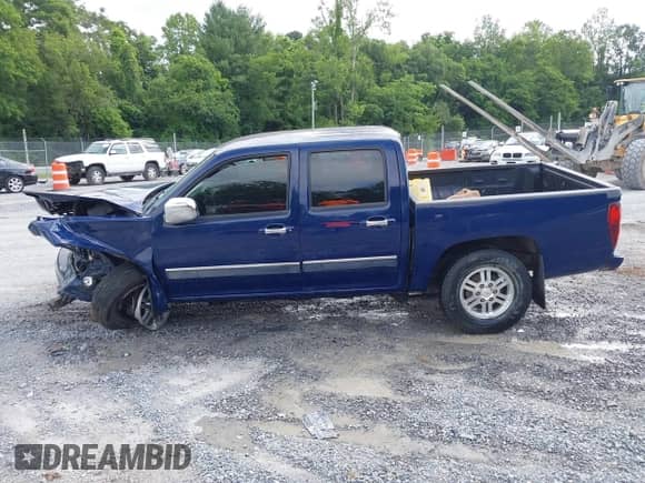 2011 Chevrolet Colorado 1LT z VIN 1GCHTCFE5B8124302, wystawiony jako IAAI lot #42494908 z przebiegiem 121 194 mil mil oraz . Historia ofert i sprzedaży dostępna na DreamBid. Obrazek 14.