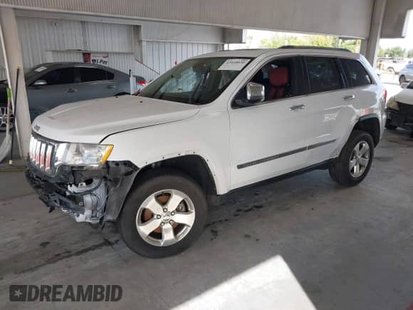 2013 Jeep Grand Cherokee Limited z VIN 1C4RJEBG6DC595730, wystawiony jako IAAI lot #43418036 z przebiegiem 163 431 mil mil oraz . Historia ofert i sprzedaży dostępna na DreamBid. Obrazek 19.