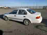 1998 Chevrolet Prizm with VIN 1Y1SK5284WZ433758, listed as a Copart auction lot 49698725 with 123,154 mi miles and Salvage title. Bid and sale history available at DreamBid. Image 2.