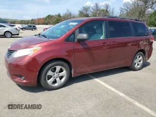 2011 Toyota Sienna LE AAS with VIN 5TDKK3DCXBS120266, listed as a Copart auction lot 65960795 with 223,675 mi miles and Salvage title. Bid and sale history available at DreamBid. Image 1.