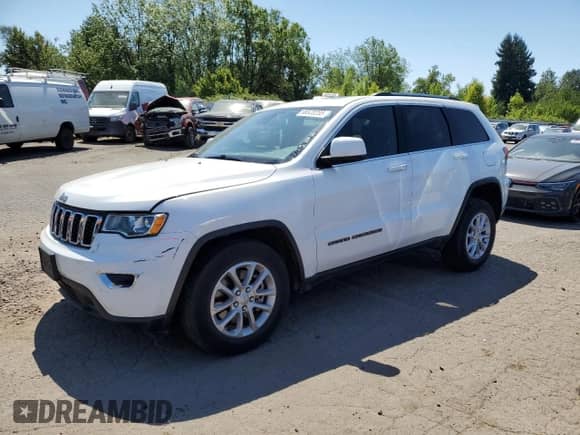 2021 Jeep Grand Cherokee Laredo E with VIN 1C4RJFAG2MC839560, listed as a Copart auction lot 66520265 with 33,127 mi miles and Salvage title. Bid and sale history available at DreamBid. Image 1.