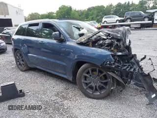 2020 Jeep Grand Cherokee High Altitude z VIN 1C4RJFCG0LC148801, wystawiony jako IAAI lot #42660249 z przebiegiem 86 972 mil mil oraz . Historia ofert i sprzedaży dostępna na DreamBid. Obrazek 1.