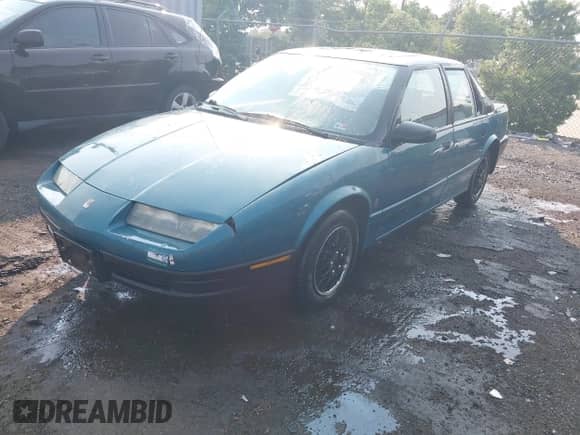 1995 Saturn SL with VIN 1G8ZH5287SZ132326, listed as a IAAI auction lot 42403334 with 122,285 mi miles and . Bid and sale history available at DreamBid. Image 2.