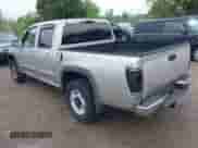 2007 Chevrolet Colorado 1LT z VIN 1GCDT13E878160175, wystawiony jako IAAI lot #42414121 z przebiegiem 170 544 mil mil oraz . Historia ofert i sprzedaży dostępna na DreamBid. Obrazek 3.