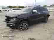 2017 Jeep Grand Cherokee Overland with VIN 1C4RJFCG2HC866857, listed as a Copart auction lot 81090725 with 119,242 mi miles and Salvage title. Bid and sale history available at DreamBid. Image 1.