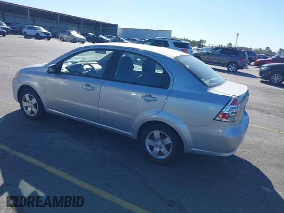 2009 Chevrolet Aveo 1LT z VIN KL1TD56E89B326736, wystawiony jako IAAI lot #43506009 z przebiegiem 106 025 mil mil oraz . Historia ofert i sprzedaży dostępna na DreamBid. Obrazek 3.