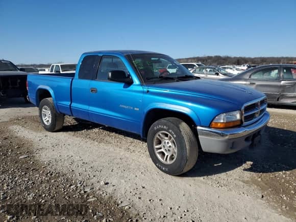 2001 Dodge Dakota with VIN 1B7GG22X01S283618, listed as a Copart auction lot 42608555 with 142,307 mi miles and Salvage title. Bid and sale history available at DreamBid. Image 4.