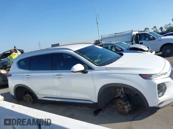 2020 Hyundai Santa Fe SEL z VIN 5NMS33AD9LH143083, wystawiony jako IAAI lot #43385274 z przebiegiem 60 666 mil mil oraz . Historia ofert i sprzedaży dostępna na DreamBid. Obrazek 13.