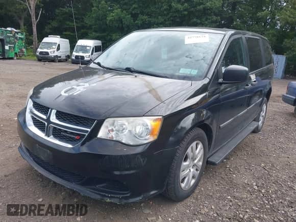 2014 Dodge Grand Caravan SE with VIN 2C4RDGBG6ER327935, listed as a IAAI auction lot 42778118 with 107,766 mi miles and . Bid and sale history available at DreamBid. Image 2.