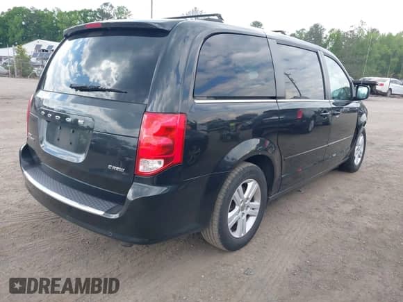2013 Dodge Grand Caravan Crew with VIN 2C4RDGDG9DR507504, listed as a IAAI auction lot 42191224 with Not provided miles and . Bid and sale history available at DreamBid. Image 4.