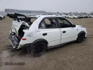 2002 Hyundai Accent GL с VIN KMHCG45C92U271388, выставлен на аукционе Copart как лот 85925124 с пробегом 98 390 миль миль и Списание • Salvage title. История ставок и продаж доступна на DreamBid. Изображение 3.