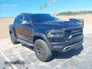 2022 Ram 1500 TRX with VIN 1C6SRFU95NN346475, listed as a IAAI auction lot 39200422 with 14,919 mi miles and . Bid and sale history available at DreamBid. Image 1.
