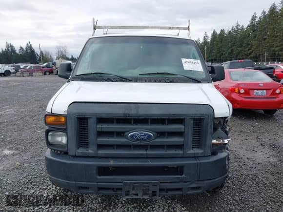 2010 Ford Econoline Cargo Commercial with VIN 1FTNS2EW5ADA17198, listed as a IAAI auction lot 41835259 with 219,319 mi miles and . Bid and sale history available at DreamBid. Image 12.