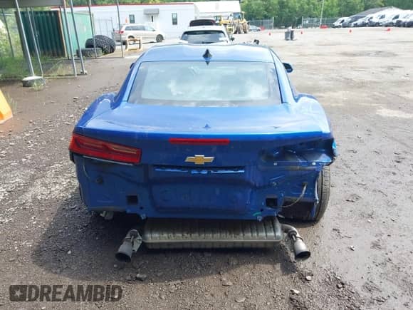 2018 Chevrolet Camaro 1LS z VIN 1G1FA1RX6J0133403, wystawiony jako IAAI lot #42991863 z przebiegiem 63 565 mil mil oraz . Historia ofert i sprzedaży dostępna na DreamBid. Obrazek 16.