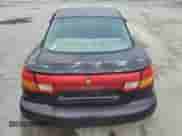 2000 Saturn SC с VIN 1G8ZP128XYZ176888, выставлен на аукционе Copart как лот 64061245 с пробегом 234 516 миль миль и Списание • Salvage title. История ставок и продаж доступна на DreamBid. Изображение 6.