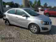 2014 Chevrolet Sonic LS с VIN 1G1JB5SH6E4231427, выставлен на аукционе Copart как лот 71973785 с пробегом 104 215 миль миль и Чистый • Clean title. История ставок и продаж доступна на DreamBid. Изображение 4.
