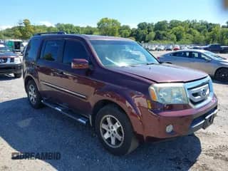2009 Honda Pilot Touring with VIN 5FNYF48939B005946, listed as a IAAI auction lot 43178572 with 158,130 mi miles and . Bid and sale history available at DreamBid. Image 1.