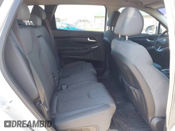 2019 Hyundai Santa Fe SE z VIN 5NMS2CAD0KH001481, wystawiony jako IAAI lot #43080403 z przebiegiem 82 196 mil mil oraz . Historia ofert i sprzedaży dostępna na DreamBid. Obrazek 8.